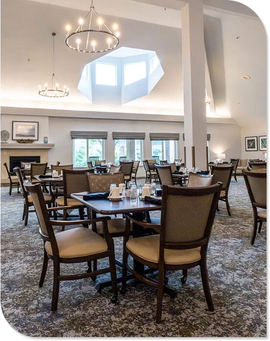 Upscale Dining Area With Chandeliers and Vaulted Ceiling at an Independent Living Community Upscale Dining Area With Chandeliers and Vaulted Ceiling at an Independent Living Community
