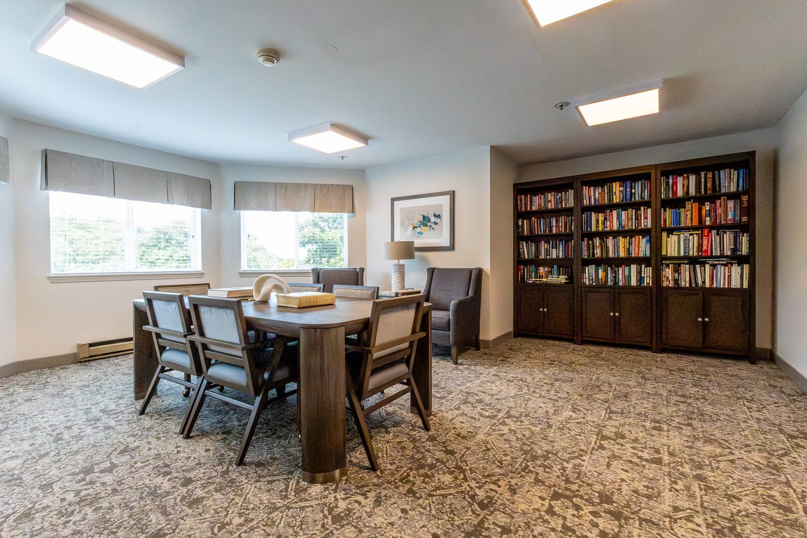 Quiet Library and Reading Room With Full Bookshelves at an Independent Living