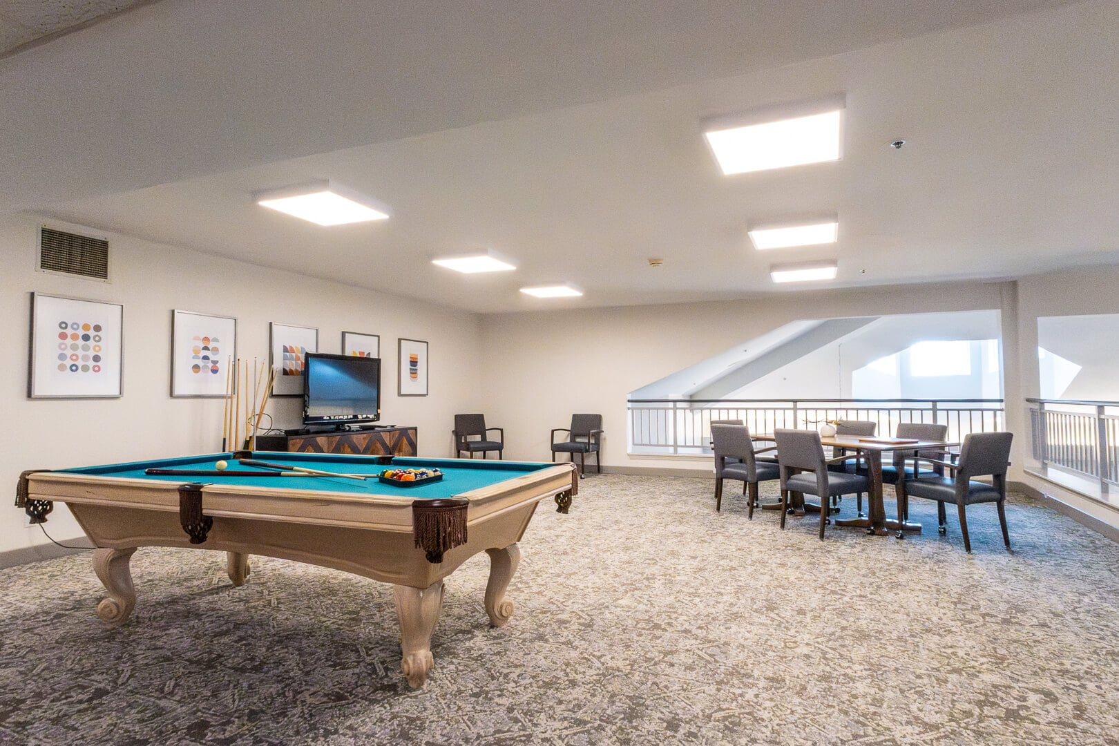 Recreational Game Room With Pool Table for Elderly Residents at an Independent Living